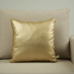 Coussin similicuir doré - bords beiges