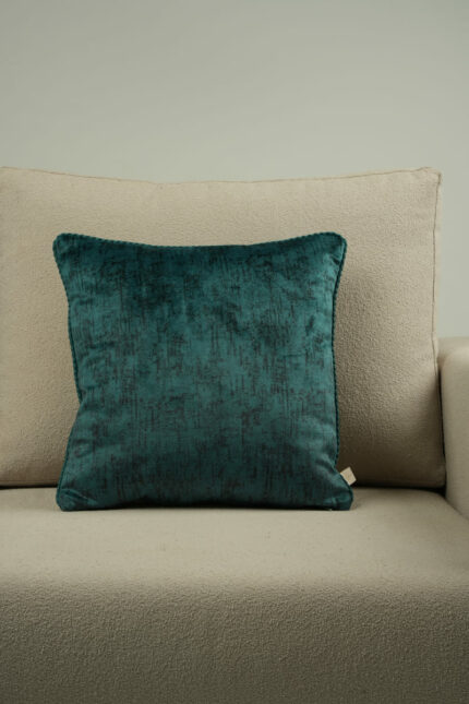 Coussin vert en velours de soie - bords verts