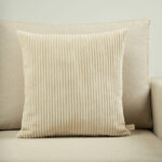 Coussin rayé beige