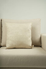 Coussin beige clair effet marbré